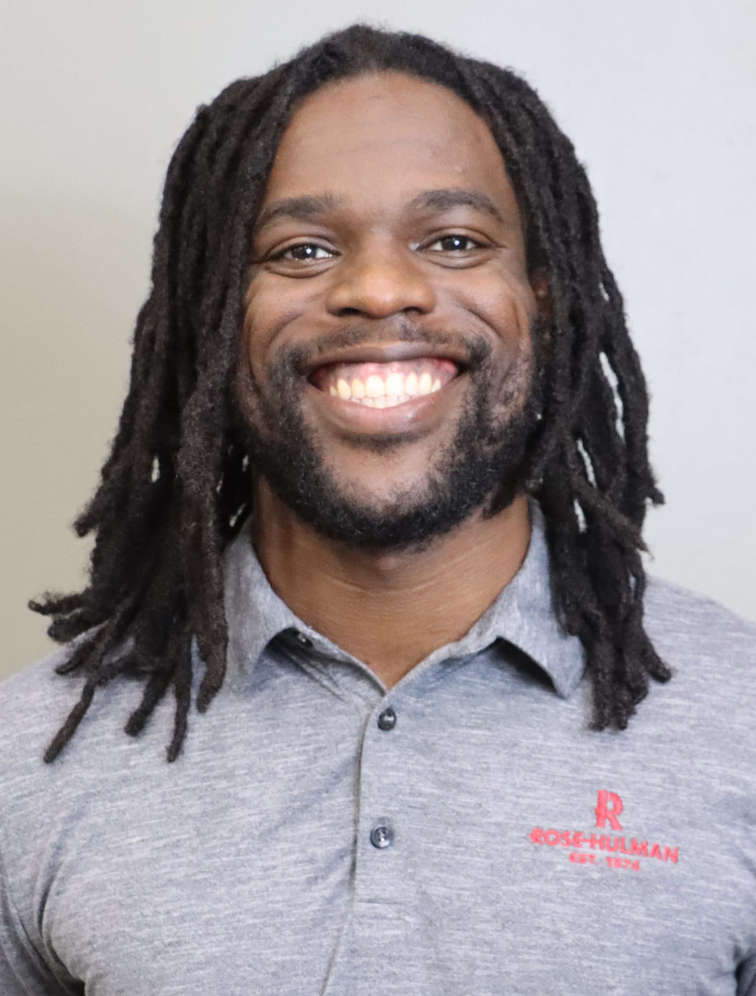 TRACK Coach Mills Headshot 2024