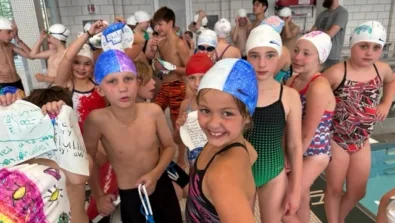 Carneige Mellon Nike Swim Camp Camper Smiling