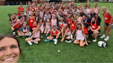 Xcelerate lacrosse girls group shot coach
