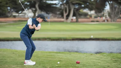 Nike Junior Golf Camp tee shot over water png