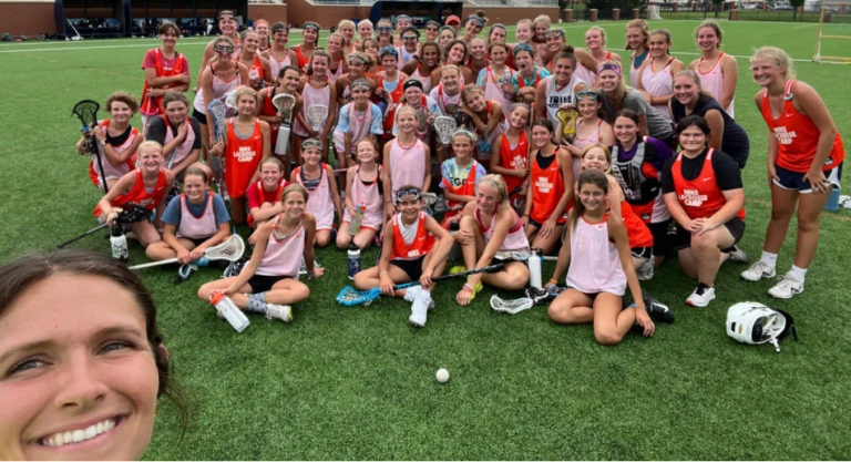 Xcelerate lacrosse girls group shot coach