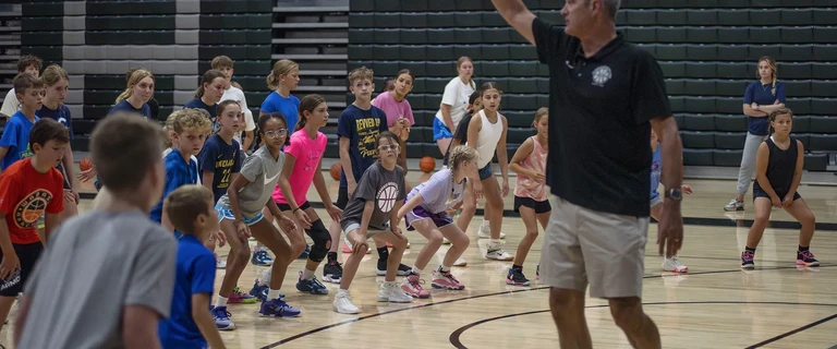 Сhildren train at mccracken basketball camp