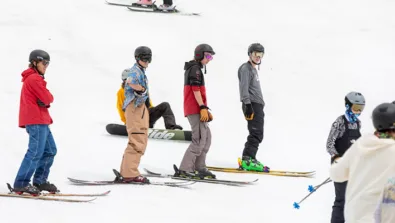 Windells Ski Camp camper wait to hit rail jpg