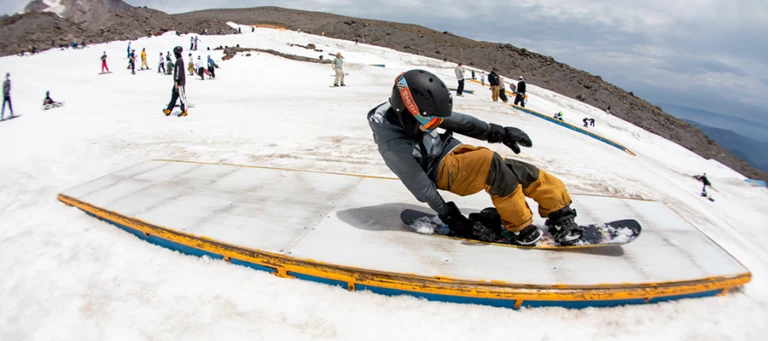 High Cascade Snowboard Camp camper tail slides jpg