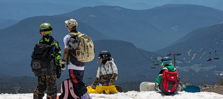 High Cascade Snowboard Camp camper wait at top of run jpg