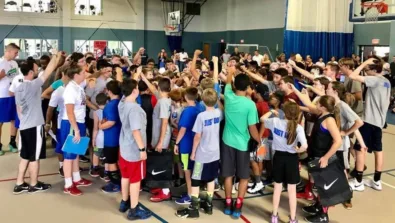 Saint Anselm College nike basketball camp team huddle