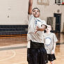 Boys Shooting Basketball at summer camp
