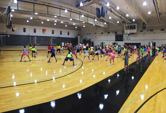 Lewis Clark College Girls Gym working on Basketball Drills at the youth basketball camp