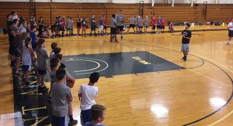 Saint Anselm College has collegiate basketball coaches who give great instructions