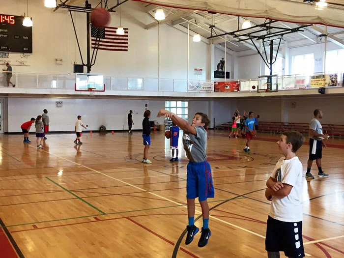 Hyannis Youth and Community Center summer basketball camp for boys and girls where campers learn jump shots