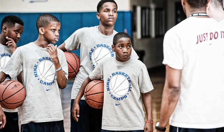 Boys Coach Instruction at the youth boys basketball camp
