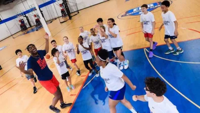 Coed coach looking at camera