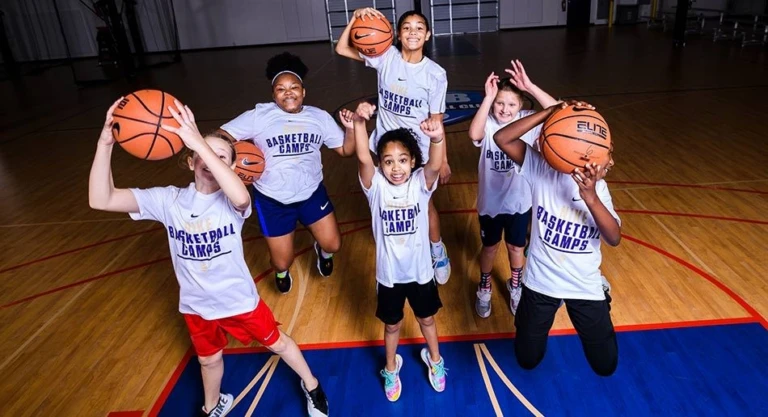 Girls team pic jumping smiling
