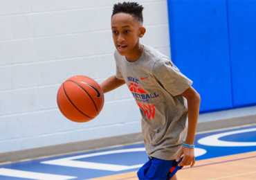 Kyrie Irving Drill Tip at a basketball youth camp