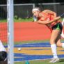 Worcester State Field Hockey Girl Hitting Ball