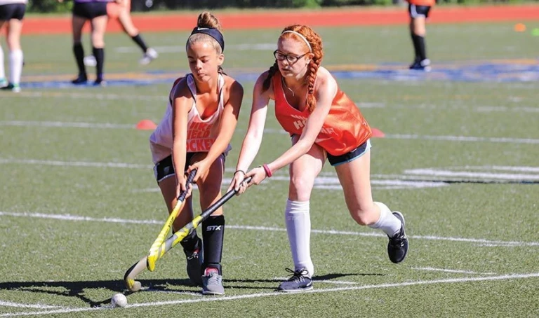 Worcester State Field Hockey Girls Competing