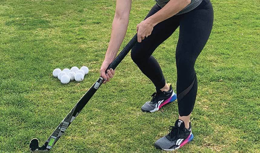 Field hockey hand placement on stick