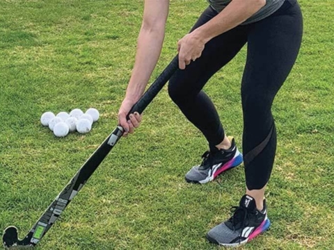 Field hockey hand placement on stick