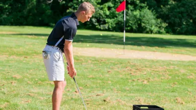 Nike Junior Golf Camp chipping practice png