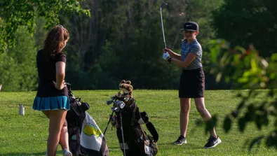 Nike Junior Golf Camp girls tee shot practice png