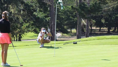 Nike Junior Golf Camp lining up putt png