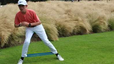 Nike Junior Golf Camp working out before tee time png