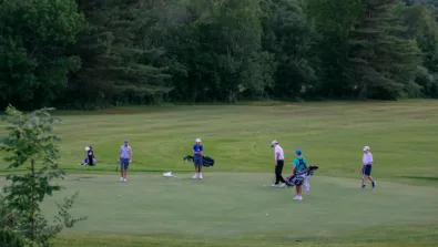 Nike Junior Golf Camp putting green meeting