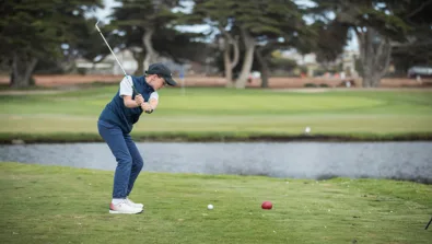 Nike Junior Golf Camp tee shot over water
