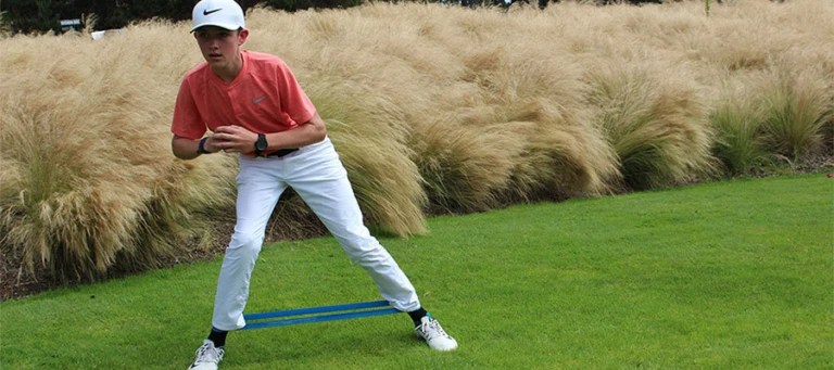 Nike Junior Golf Camp working out before tee time png