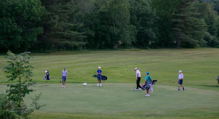 Nike Junior Golf Camp putting green meeting