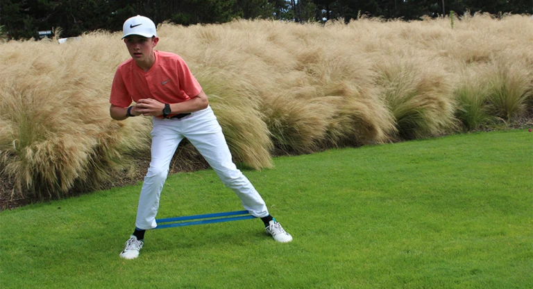 Nike Junior Golf Camp working out before tee time
