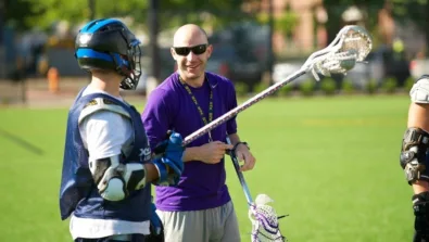 Xcelerate Lacrosse Camp Boys Coach Smiling