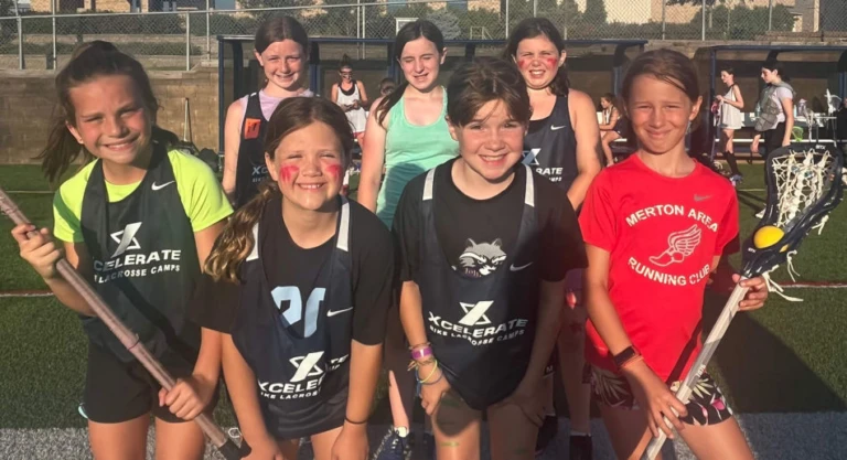 Xcelerate lacrosse girls group smile