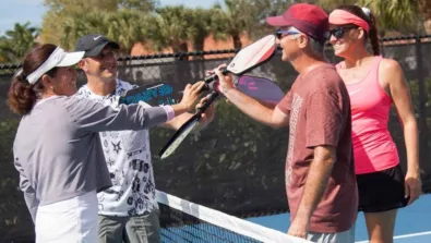Photoshoot 2 pickleball group paddles in
