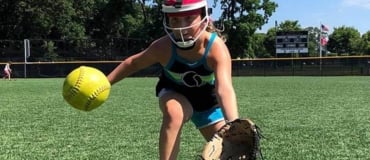 Camper with facemask watches the ball carefully