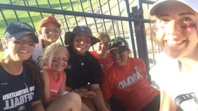 Campers smile for selfie at Nike Softball Camp