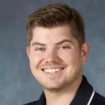 Chris pospisil headshot johns hopkins swimming