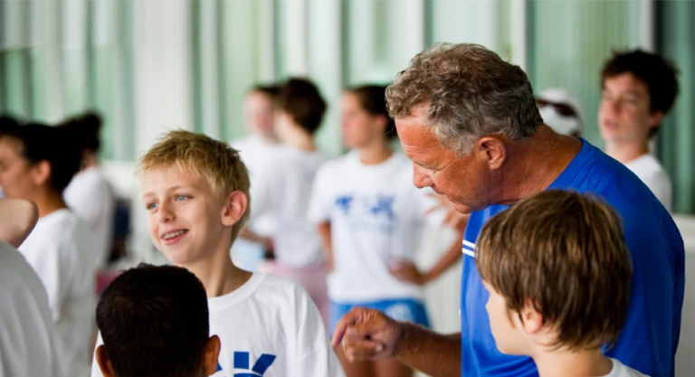 Peak Performance Swim Camp Coach Nick Baker Instructs Swimmers