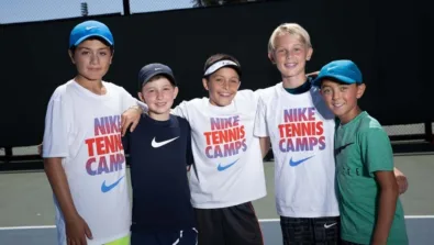 Tennis boys group smiling