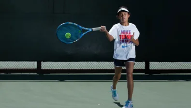 Tennis girl straigh on forehand