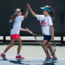 Tennis girls high five