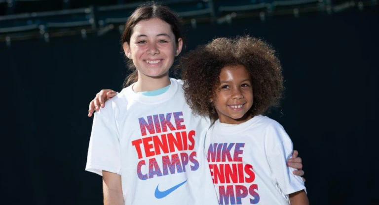 Tennis grils smiling