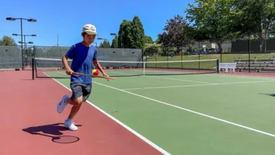 Oregon elite jesuit camper fitness ball on racquet 1