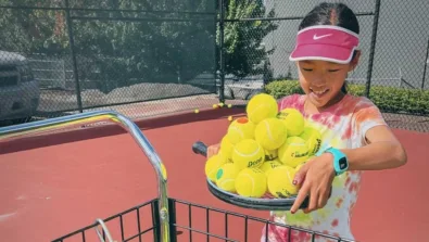 Oregon elite jesuit girl solo tennis balls basket