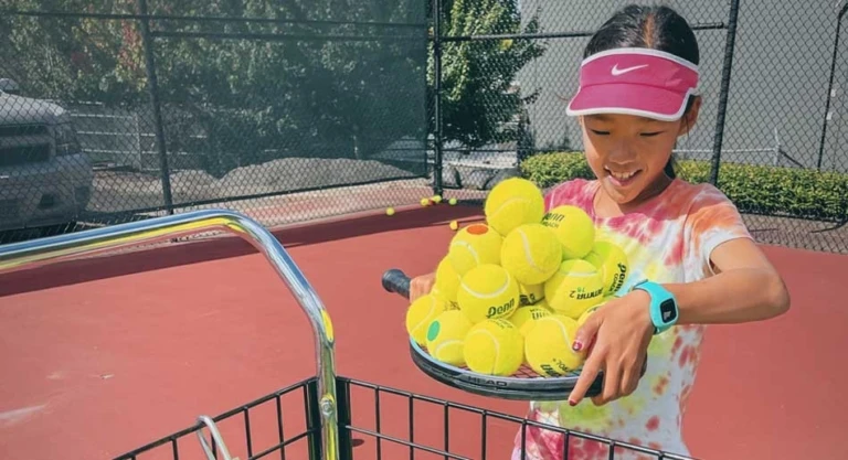 Oregon elite jesuit girl solo tennis balls basket
