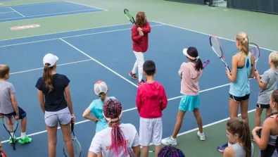Lele Forood Instructing Campers Tennis Camp Stanford