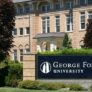 George Fox University campus sign in front of brick building
